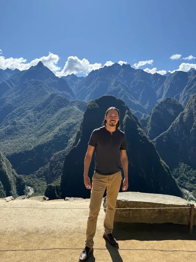 Lane standing above the valley at Machu Picchu